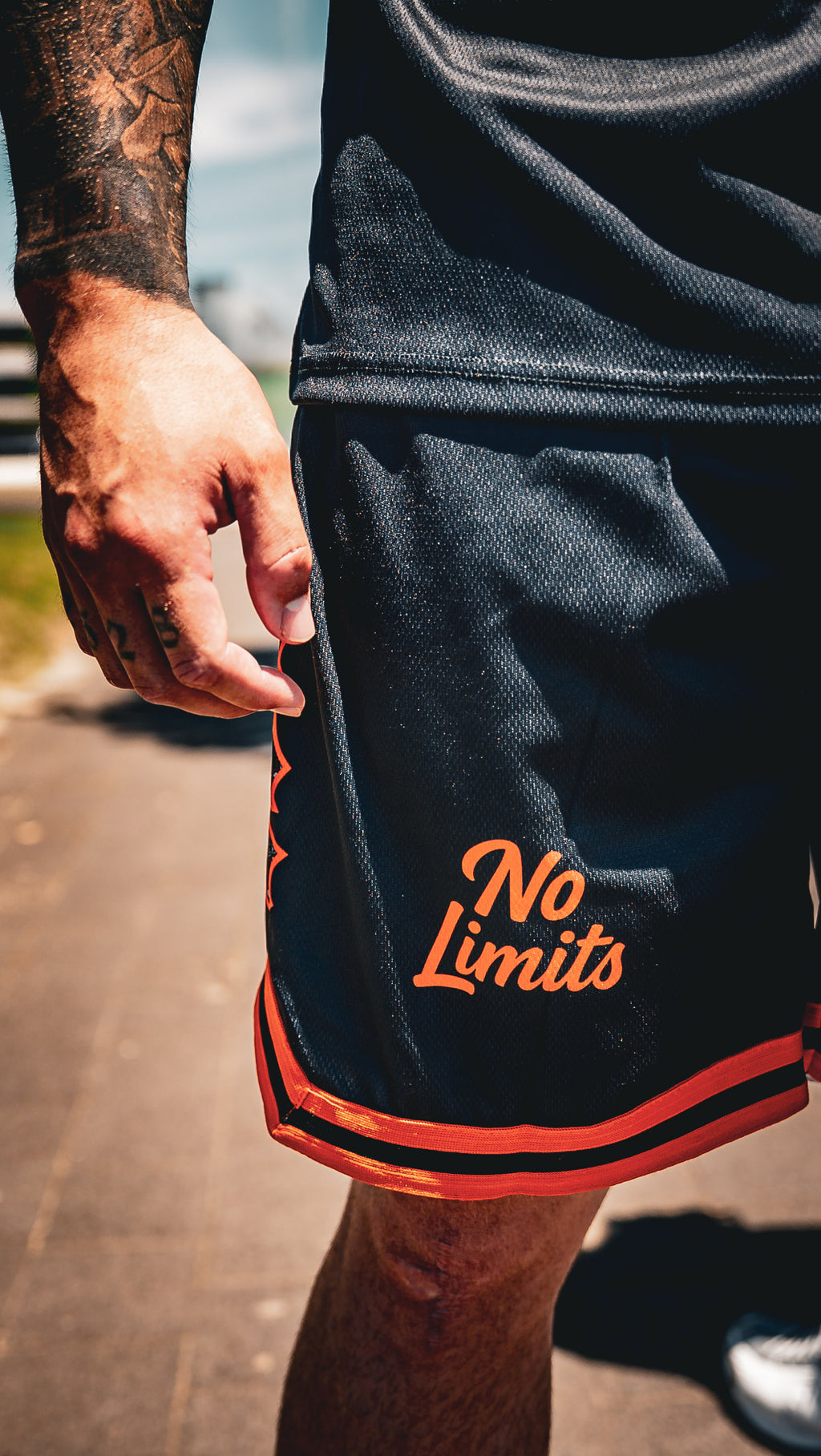 Black/Orange No Limit Basketball Shorts