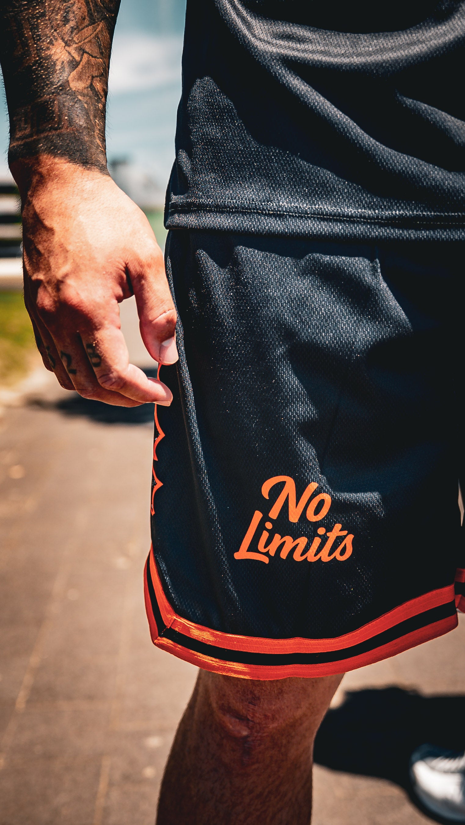 Black/Orange No Limit Basketball Shorts